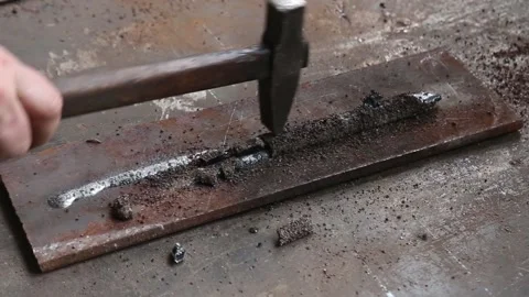 Man processes metal for welding Stock Footage 158147688