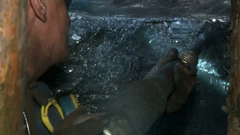 The man produces coal miner using a jackhammer Stock Footage 89932695