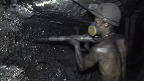 The man produces coal miner using a jackhammer Stock-Footage 94125782