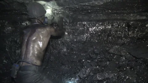 The man produces coal miner using a jackhammer Stock-Footage 94127285