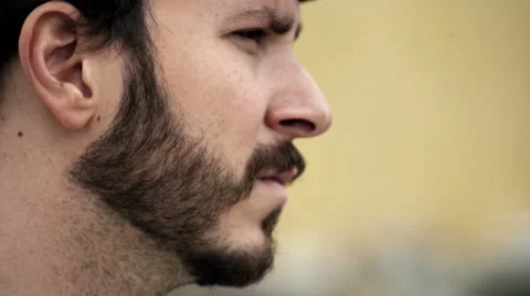  man in profile that is attacking someone verbally Video stock 68977091