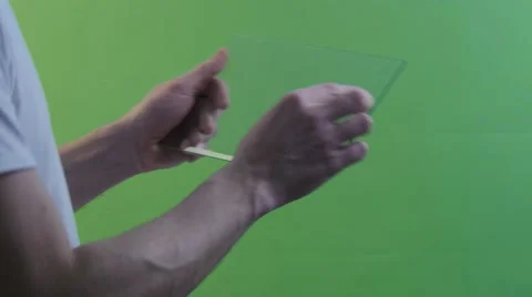 Man in Profile With Tablet Screen to Camera Businessman With Virtual Tablet Stock Footage 61011719