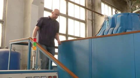 Man programing a cubic-presser at synthetic diamonds factory 動画素材 51626259