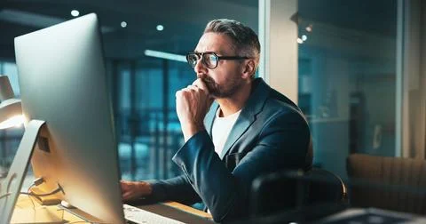 Man, programmer and thinking with computer at night for server programming Stock-Fotos