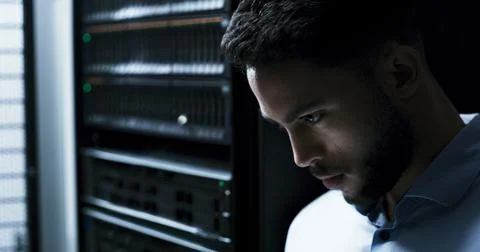 Man, programmer and thinking in server room for maintenance, inspection or Stock Photos