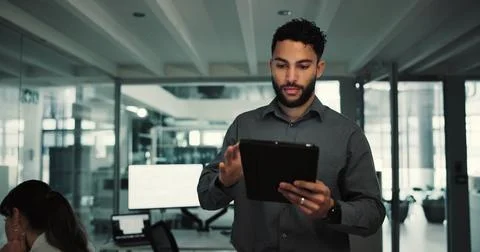 Man, programmer and typing with tablet in office for research, server updat.. Stock Photos