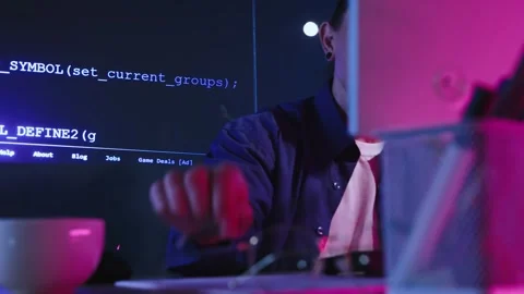 Man, programmer, app developer writing code on computer, coding information of Stock Footage 245343715