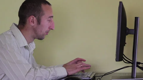 A man programmer fell asleep at the computer Stock Footage 274259829