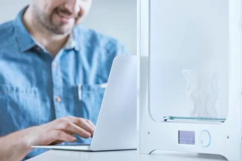 Man programming 3D printer Stock Photos