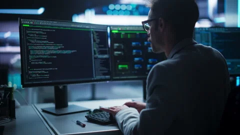 Man Programming Stock-Footage 256046669