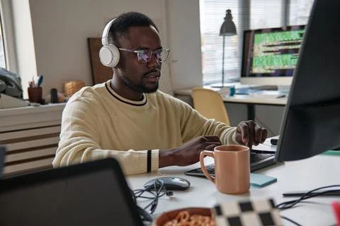Man Programming on Laptop Stock Photos