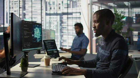 Man programming in office using artificial intelligence tech Stock Footage 318237689