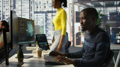 Man programming in office using artificial intelligence tech 스톡 사진