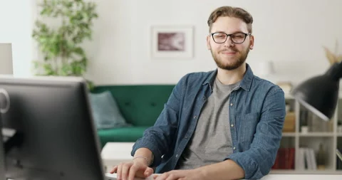 Man programming on pc at home Stock Footage 189034678