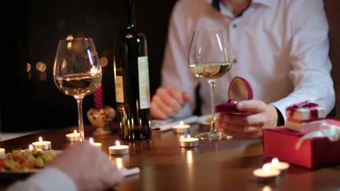 A man proposes to his partner to marry during a romantic Stock-Footage 149421533