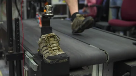Man with prosthesis leg exercising on treadmill Stock Footage 93519976