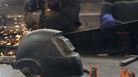 Man in protective clothing while working in the metal cutting shop in the Stock-Footage 153933394