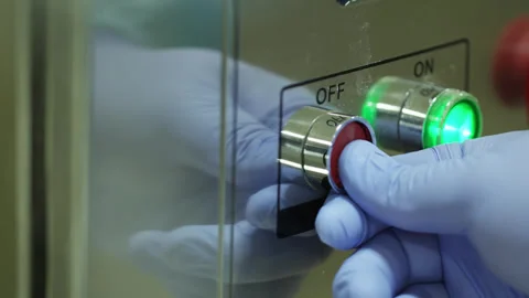 Man in protective gloves setting up scientific equipment. Stock Footage 271236648