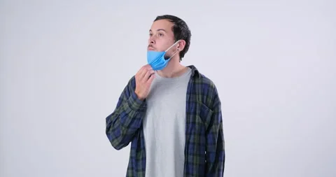 Man in the protective mask does not smell Stock Footage 143944008