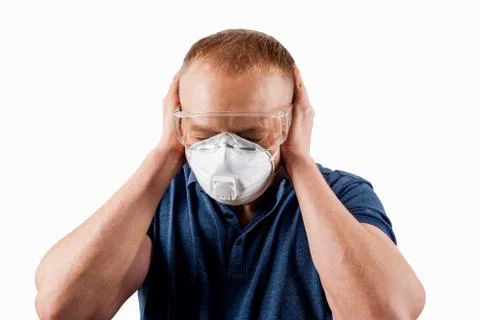 Man in a protective mask isolated on a white background. Stock Photos