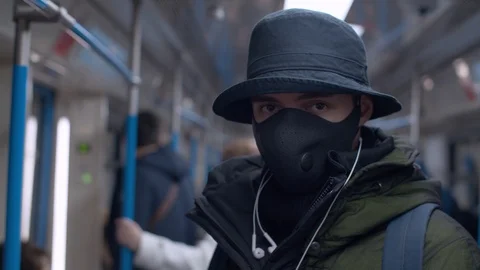 Man in protective mask in subway Stock Footage 126821168