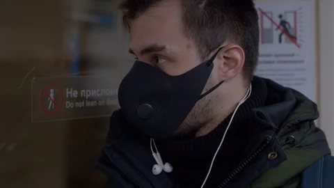 Man in protective mask in subway Stock Footage 126823174