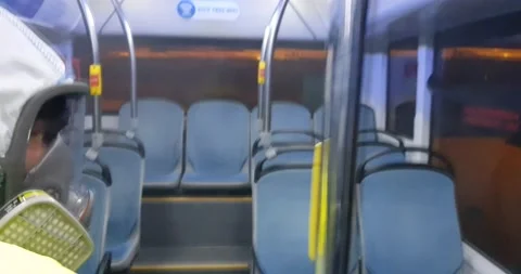 Man In Protective Suit Decontaminating A Bus During Virus Outbreak Stock Footage 131050064