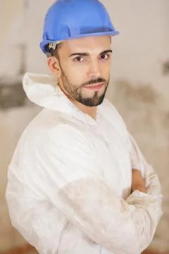 Man in protective suit looking at camera Stock Photos