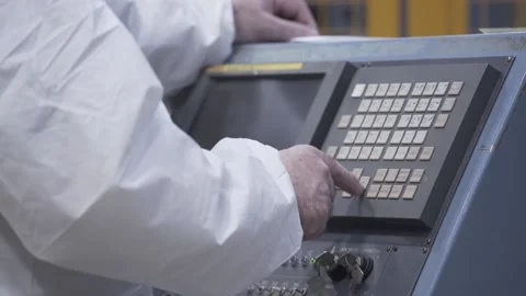 Man in protective suit using controls 動画素材 237096837