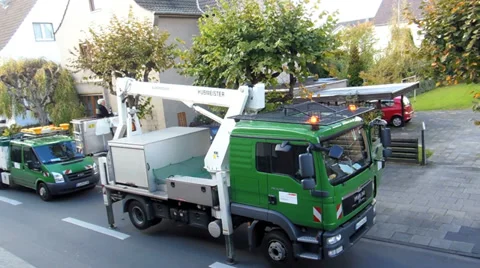 Man pruning trees using a lift Video stock 32378994