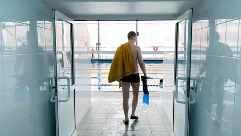 Man in public pool Stock Footage