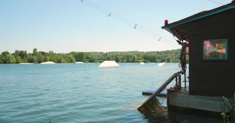 Man Pulled By Cable For Water Ski Lift Fall In The Lake Water Of Stock Footage 156728864