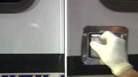 Man pulled out of ambulance in stretcher, Stock Footage 965958