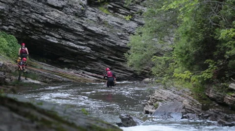 Man pulled out of river by nautical rescue team Stock Footage 65764473