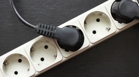 Man pulling a cable out from the socket 動画素材 64622311