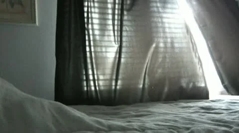 Man Pulling Curtains Open Stock Footage 12611451