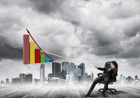 Man pulling with effort big pulling rope graph, as a symbol of financial growth Stock Photos