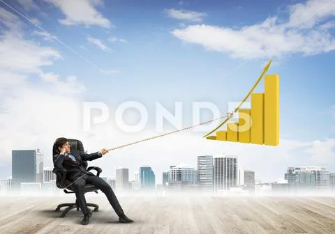Man pulling with effort big pulling rope graph, as a symbol of financial growth Stock Photos
