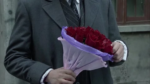 Man pulling flower petals Stock Footage 249510191