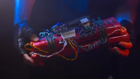 Man Pulling a Hand Made Dynamite Bomb From Under His Shirt Stock Footage 90711669