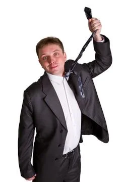 Man pulling necktie out to choke himself while making facial expression Fotos de archivo