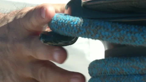 Man pulling a rope on a winch  스톡 동영상 43318653