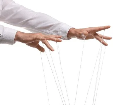 Man pulling strings of puppet on white background, closeup Stock Photos
