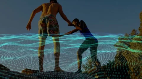 Man pulling woman up onto ledge, helping balance, turquoise tech wave animating Stock Footage 331287069