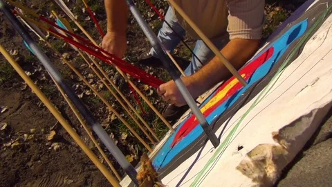 The man pulls the arrows from the target. 스톡 동영상 71831217