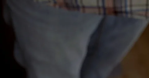 The man pulls the bitcoins out of his pocket and count it Stock Footage 85689447