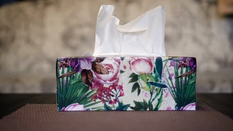 The man pulls the cloth from the package. Close-up Stock Footage 126237980