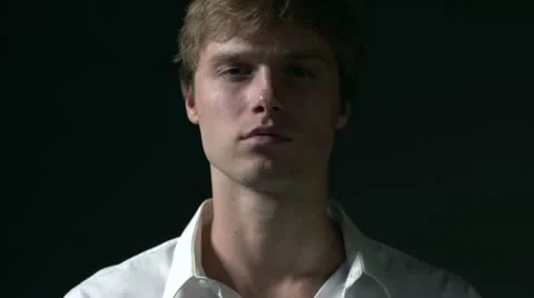 Man pulls a gun and points at camera, shift focus Stock Footage 11858137