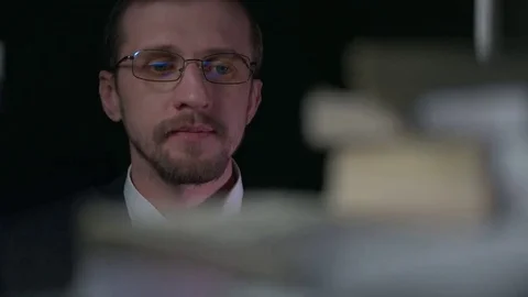 Man pulls a gun out of the safe and money Vídeos de archivo 69221296