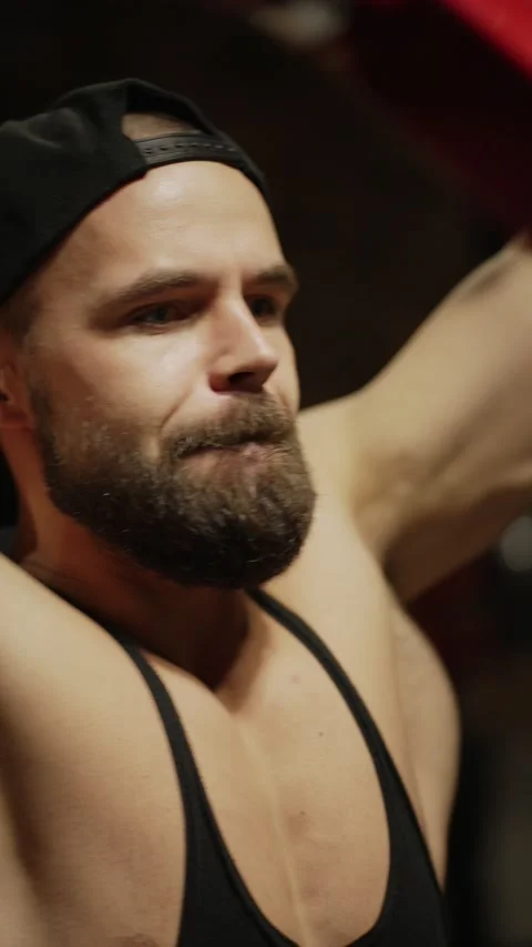 A man pulls a heavy weight in the gym Stock Footage 225671758